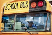 Minneapolis Public Schools mechanic Johnny Barton performed preventive maintenance on buses Tuesday before the start of the school year. MARK VANCLEAV