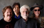 Members of the Doobie Brothers, from left, Tom Johnston, John McFee, Michael McDonald and Pat Simmons.