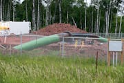 File photo from 2018 on work being done at the Minnesota-Wisconsin boarder on the Line 3 pipeline replacement. (AP Photo/Jim Mone, file)