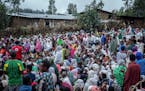Displaced Ethiopians from the Amhara region wait for aid distributions at a center for the internally-displaced in Debark, in the Amhara region of nor
