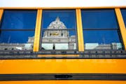 This file photo shows a school bus outside the Minnesota State Capitol in February 2020.