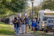 St. Paul Central High School students made their way to campus by foot, car, or city bus, but not by a yellow school bus, Thursday, September 9, 2021 
