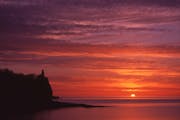 The sun rises on Lake Superior in autumn, 2006.