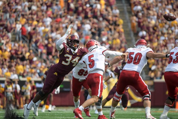 Gophers defensive end Boye Mafe (34) went for a tackle against Miami (Ohio) earlier this season.
