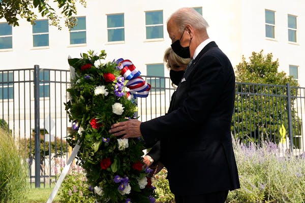 Bidens lay wreath to honor 9/11 victims