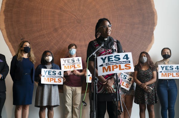Minister JaNaé Bates of Yes 4 Minneapolis, the political committee that wrote the policing charter amendment proposal, speaking at a news conference 