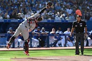 Twins catcher Ryan Jeffers missed catching a pop-up fly ball off the bat of the Blue Jays’ George Springer in the first inning Saturday in Toronto.