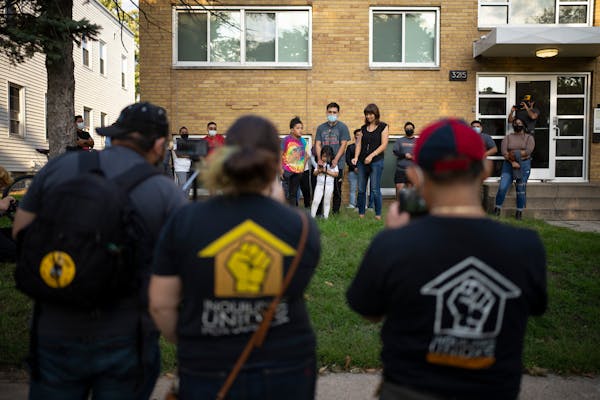 Residents of an apartment building on 21st Ave. S. in Minneapolis who are taking part in a rent strike against their landlord held a news conference o
