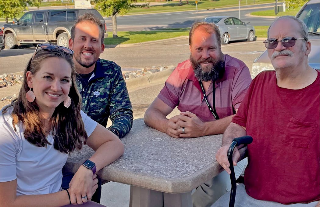 Great meeting. From left Amy Rogotzke, Dr. Mark Stuckey, Dr. Scott Staples and Bruce McElmury, an Army veteran who collapsed at a Hutchinson football game this month.