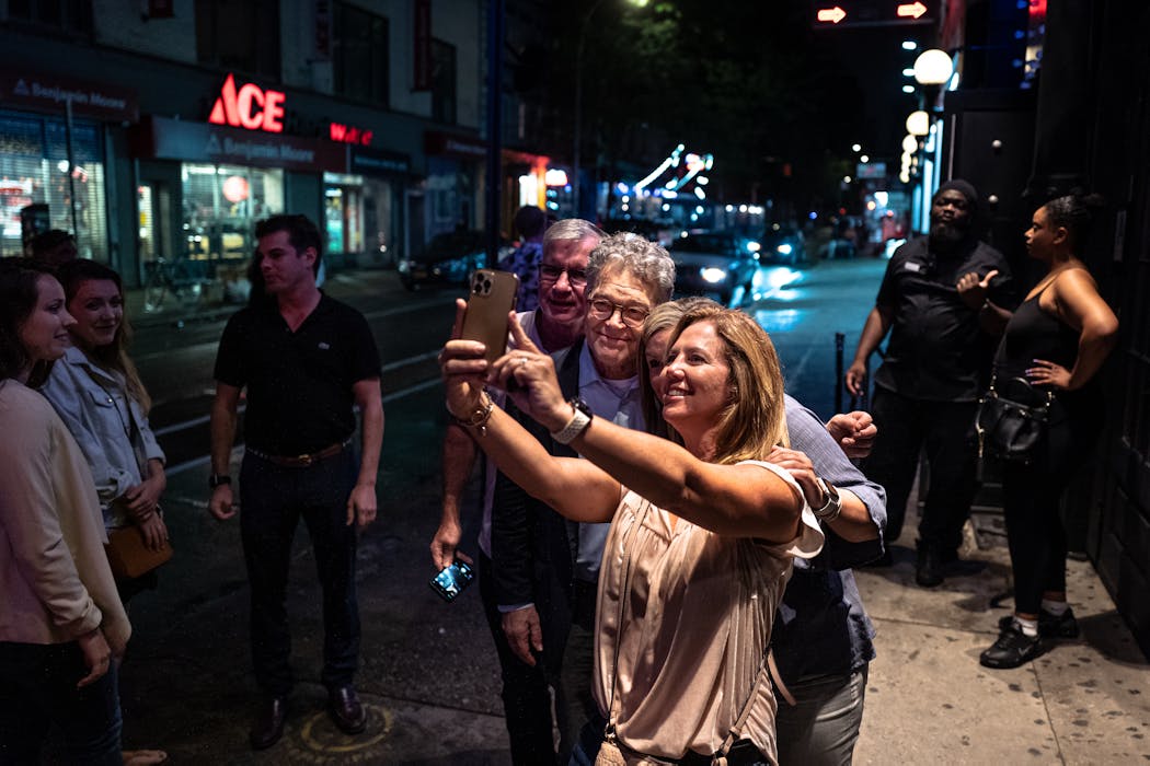 Al Franken takes a selfie with fans after performing at the Comedy Cellar in the Village Underground in New York.