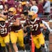 Gophers linebacker Mariano Sori-Marin, middle, celebrated an interception against Bowling Green last September.