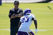 Mike Zimmer loves coaching defensive backs, such as safety Xavier Woods, and he needs to be at his best with this group now.