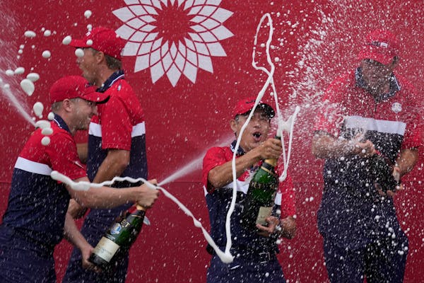 Team USA players sprayed champagne after winning the Ryder Cup on Sunday. 