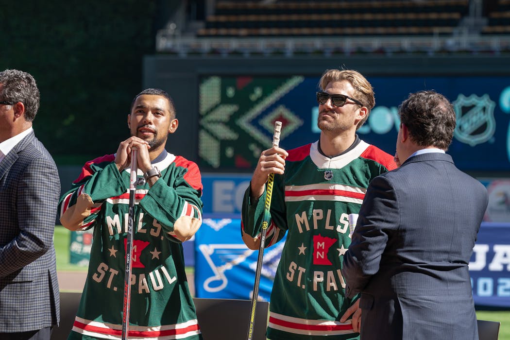 Winter Classic assistant captains Matt Dumba (left) and Marcus Foligno (right) at the press conference for the Winter Classic.