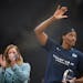 Sylvia Fowles waved to the crowd after WNBA commissioner Cathy Engelbert presented Fowles with the WNBA defensive player of the year trophy Sunday.