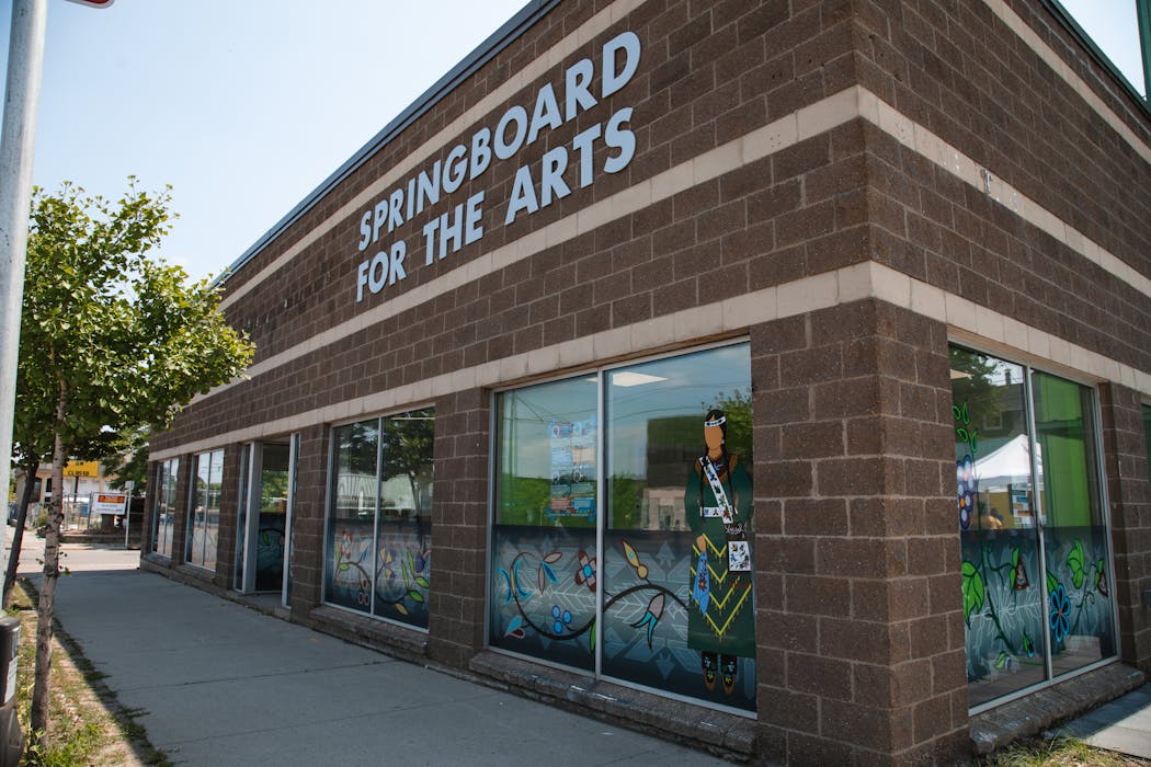 Art by Sarah Agaton Howes and Holly Young adorns the windows of Springboard’s new headquarters.