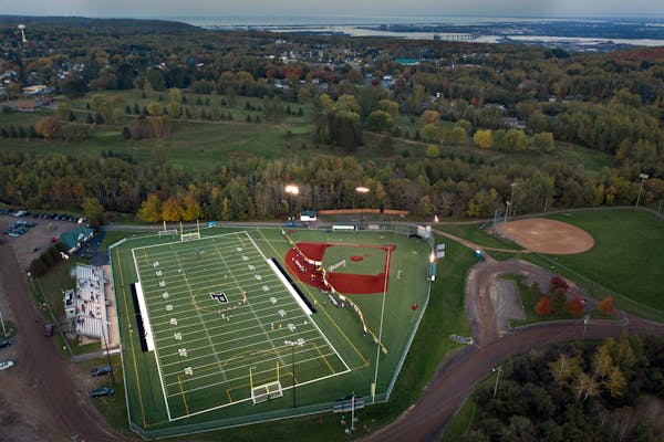 Proctor’s Terry Egerdahl field is lit up on Thursday night for a High School Soccer game. Proctor, a small town on a hill west of Duluth, reels in t