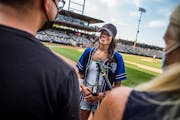 In St. Paul, Minnesota on July 1, 2021, Bachelorette Michelle Young was the star attraction at CHS Field for the Saints game.] RICHARD TSONG-TAATARII 