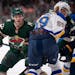 Minnesota Wild center Marco Rossi (23) was tangled up with Blues center Nikita Alexandrov after a first period faceoff.     ]  JEFF WHEELER • jeff.w