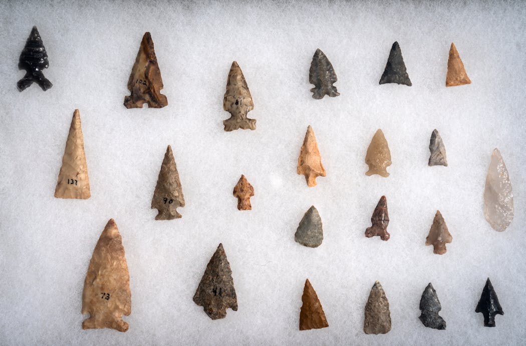Dakoka and Ojibwe arrowheads and fishing point artifacts found in Minnesota. They are located at Hocokata Ti, a cultural center and gathering space for the Shakopee Mdewakanton Sioux Community.