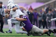 St. Thomas defensive lineman Brent Robley, shown here tackling Butler quarterback Bret Bushka, is second on the team with two sacks.
