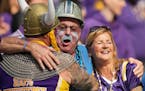 Vikings super fan Syd Davy greeted a Detroit Lions fan in the stands on Sunday.