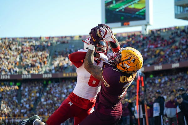 Minnesota Golden Gophers wide receiver Chris Autman-Bell (7) caught the third touchdown of the game in the second quarter as he was defended by Nebras