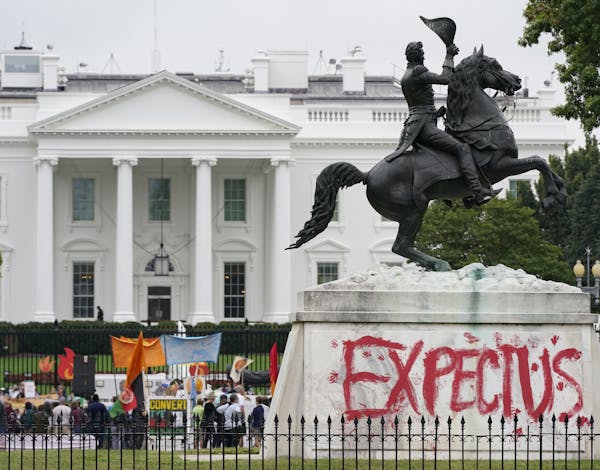 “Expect Us” was painted on the base of a statue of President Andrew Jackson as Line 3 protesters gathered in Washington.