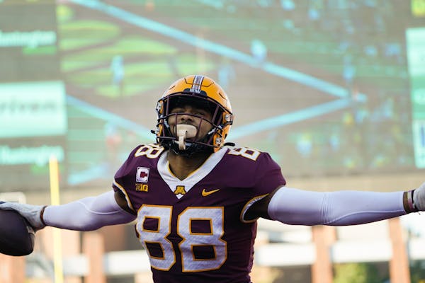 Gophers tight end Brevyn Spann-Ford (88) celebrated after his first quarter touchdown in Saturday’s 30-23 victory over Nebraska.
