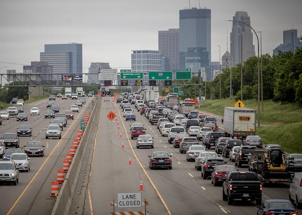 Lane closures and downtown exits slowed the early-morning commute into downtown from the 35th street bridge in June 2018 in Minneapolis.
