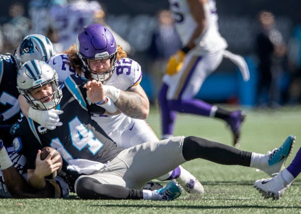 Vikings defensive tackle James Lynch had one of four sacks of Carolina quarterback Sam Darnold. 