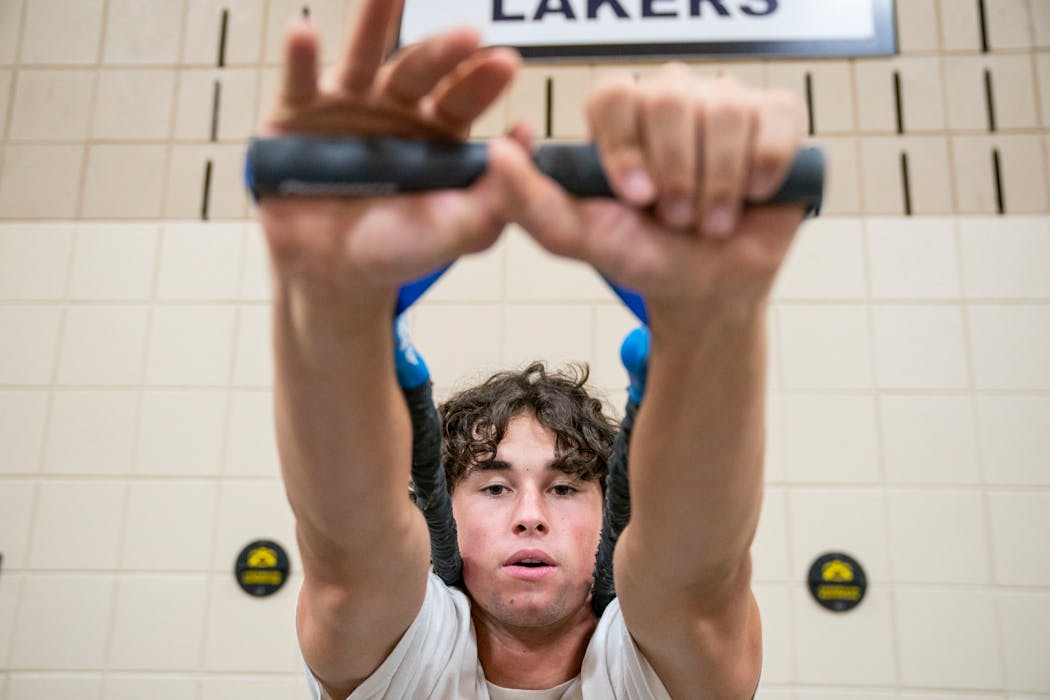 Lakeville South tight end Carter Nachreiner hit the weights ahead of a key game against Shakopee.