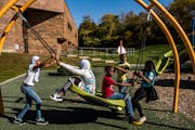 Kids played outside at St. Paul’s Highwood Hills Recreation Center on Sunday, Oct. 17. The possible closure of Highwood Hills Elementary due to low 