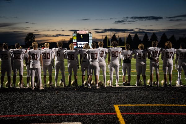 Lakeville South lined up for the national anthem before a game at Shakopee High School on Oct. 14.