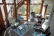 Jeanie Thomas enjoyed a cup of tea and morning newspaper in the new screened-in porch at her home in Eden Prairie.