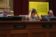 Council Member Cam Gordon (left) and Council Member Kevin Reich (right) attend a City Council meeting in July 2018. ] Shari L. Gross • shari.gross@s
