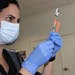 Christina Ponce, a public health nurse for Contra Costa County, California, filled syringes with the Pfizer-BioNTech COVID-19 vaccine.