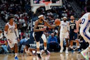 Pelicans forward Brandon Ingram moved the ball ahead during his team’s 117-97 loss to visiting Philadelphia on Wednesday.