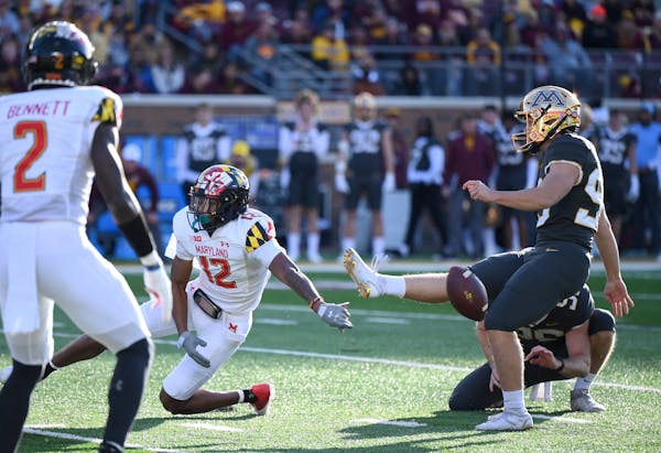 Maryland’s Tarheeb Still (12) blocked a field-goal attempt by Matthew Trickett, aggravating Gophers fans near the end of the first half Saturday.  