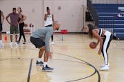 Minnesota basketball stars Michelle Young and Joe Coleman get close playing one-on-one on “The Bachelorette.”