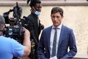 Mayor Jacob Frey addressed media members outside the Hennepin County Government Center during a news conference in August.