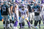Vikings defensive tackle Dalvin Tomlinson celebrated his sack of Panthers quarterback Sam Darnold on Oct. 17. The defensive challenges grow this Sunda