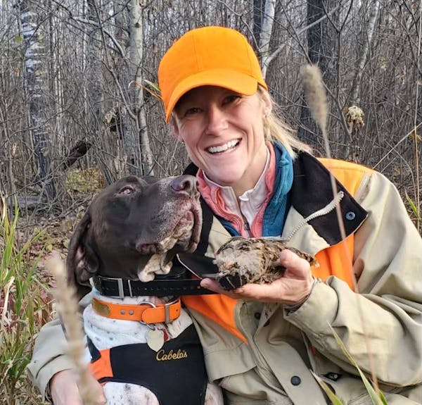 Kelly Straka, originally from Wayzata, will lead the DNR’s wildlife section from her home near Duluth. She’s shown here on a recent woodcock hunt.