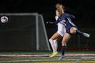 Mahtomedi’s Katelyn Beulke (9) passes with a header toward the Mankato West goal in the second half. Beulke had two goals in the Zephyrs’ 4-1 vict
