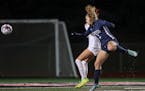 Mahtomedi’s Katelyn Beulke (9) passes with a header toward the Mankato West goal in the second half. Beulke had two goals in the Zephyrs’ 4-1 vict