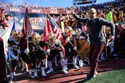 Gophers coach P.J. Fleck led the Gophers onto the field before last season’s win against Maryland.