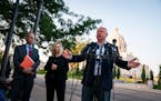 Gov. Tim Walz, speaks at a news conference outside the Capitol in June.