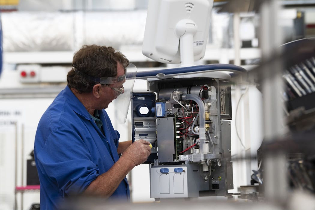 An employee working on a Medtronic ventilator in the Galway, Ireland, plant.