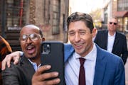 Kadir Abdulle took a selfie with incumbent Minneapolis Mayor Jacob Frey as they walked back to the campaign office after he held his first press confe