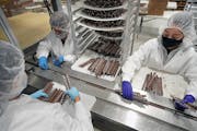 Workers at Maud Borup in Le Center, Minn., packaged chocolate-covered pretzels for the holiday season.